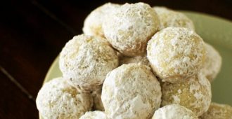 Baked Powdered Sugar Donut Holes - Fluffy donut holes baked to perfection and coated with powdered sugar. This recipe is really easy!