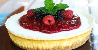 Classic Cream Cheesecake from Mixed Berry Sauce