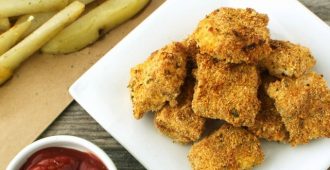 Baked Chicken Nuggets and Fries - The homemade version of one of the most popular kids meals! These homemade chicken nuggets and fries are soon to be a family favorite.