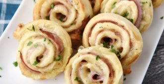 Easy Ham and Cheese Pinwheels - A ham and cheese sandwich rolled up into a fun pinwheel! They're easy to make and fun to eat.